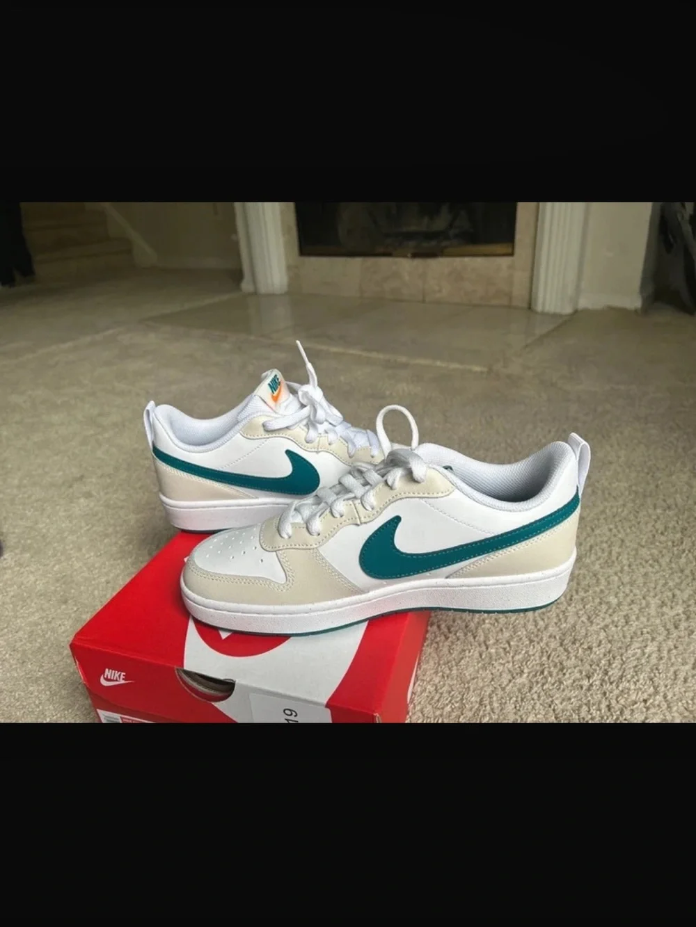 Nike Kids White Sneakers with Teal Swoosh and Cream Panels
